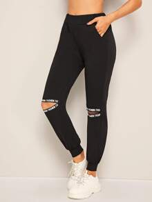 Pantalones deportivos con abertura con cinta con letra - Negro - Ver 4