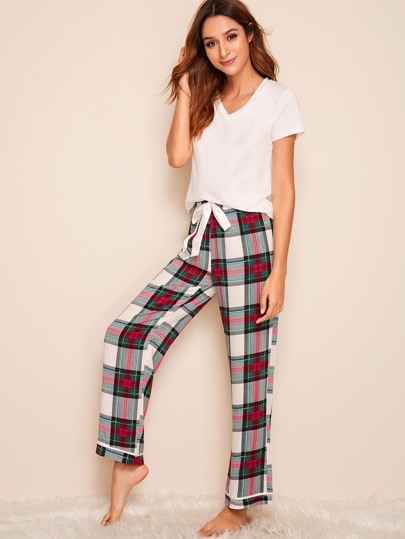 Conjunto de pijama top sólido con pantalones de cuadros