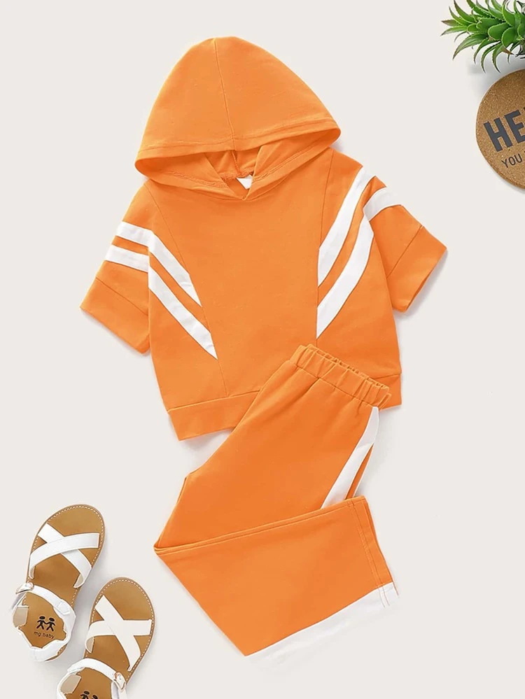 orange hoodie and sweatpants