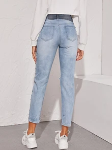 Jeans con diseño de tachuela con abertura con labado ligero