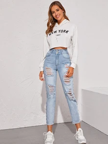 Jeans con diseño de tachuela con abertura con labado ligero