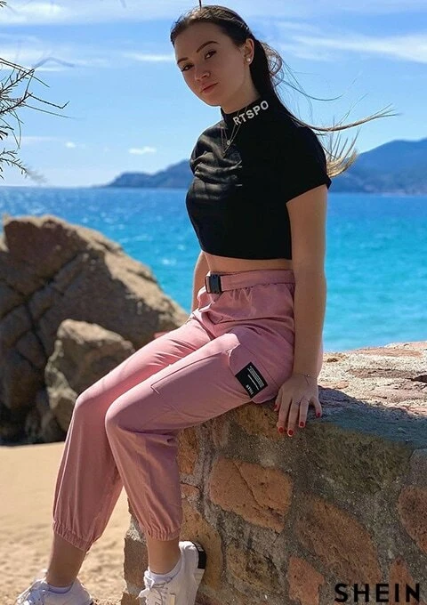 mock neck tee and belted cargo pants