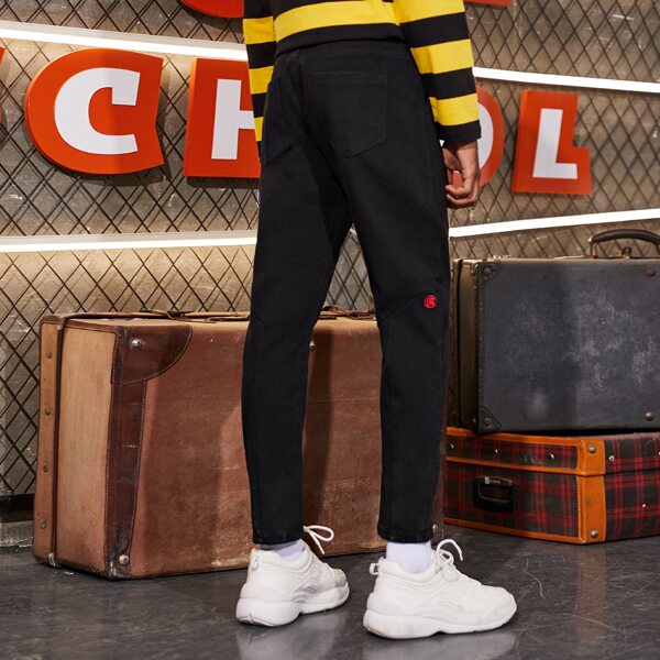 

Men Rolled Hem Button Fly Carrot Jeans