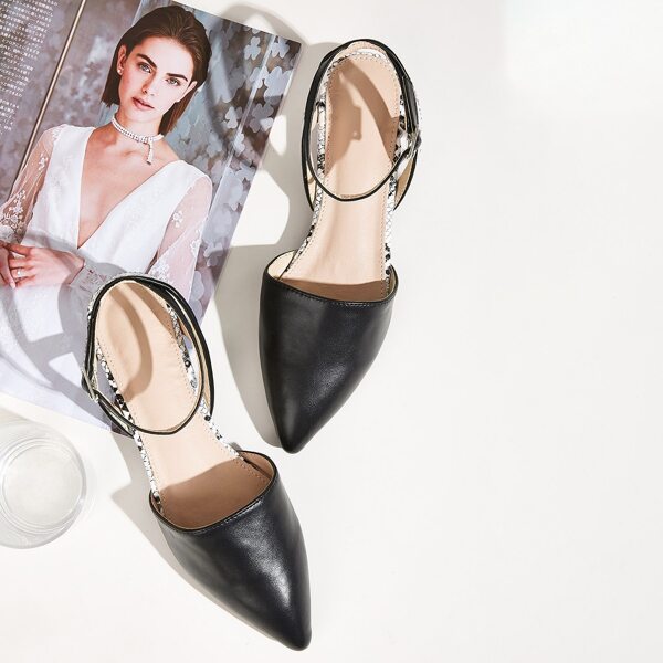 

Point Toe Snakeskin Ankle Strap Flats