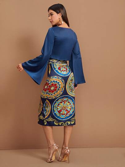 Conjunto top unicolor de manga campanuda con falda de satén con estampado tribal