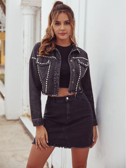 Veste en jean effilochée cloutée