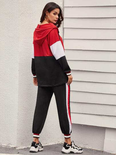 Conjunto capucha con cordón con cremallera media de color combinado con joggers