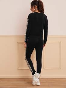 Bộ thời trang Dây kéo Snakeskin In màu đen Thể thao - màu đen - Xem 2