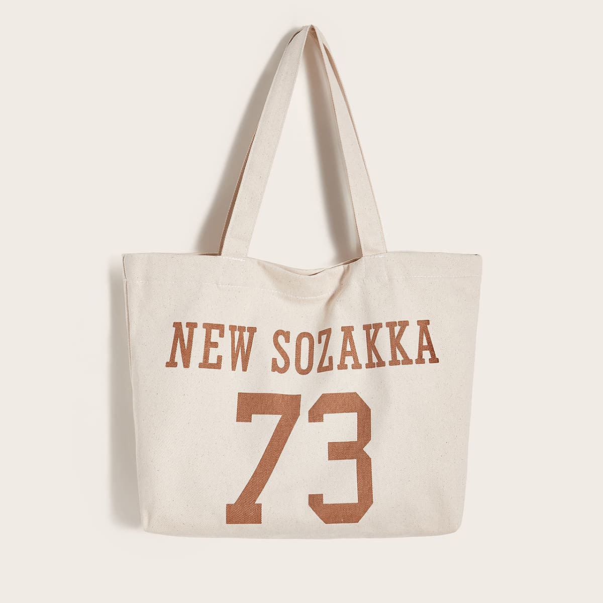 

Letter Graphic Book Bag, Beige