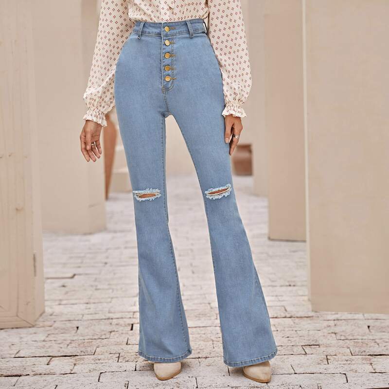 

Ripped Button Fly Flare Leg Jeans, Light wash