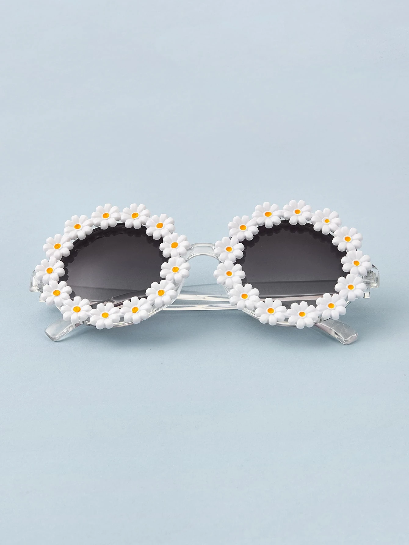 Lunettes de soleil à montures de marguerite Lunettes de soleil à montures de marguerite