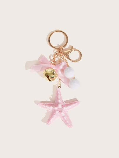 starfish shaped bag accessory with bell