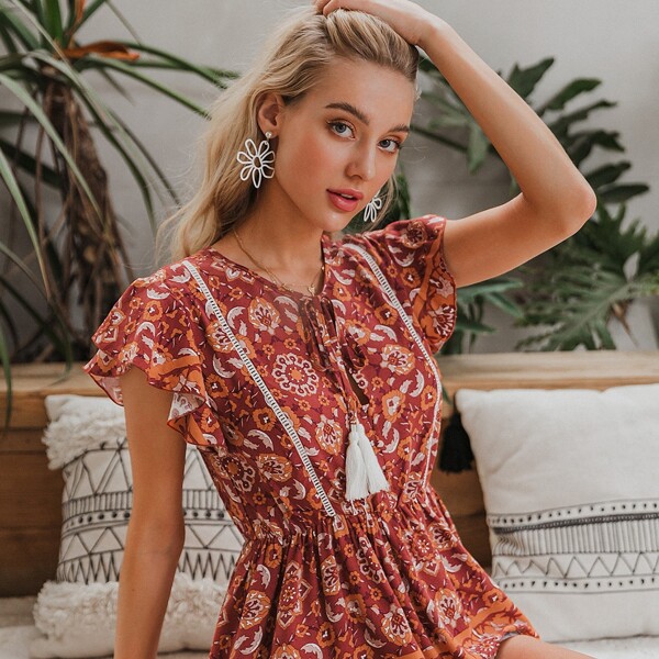 

Tassel Tie Neck Ruffle Armhole Tribal Print Peplum Top, Multicolor