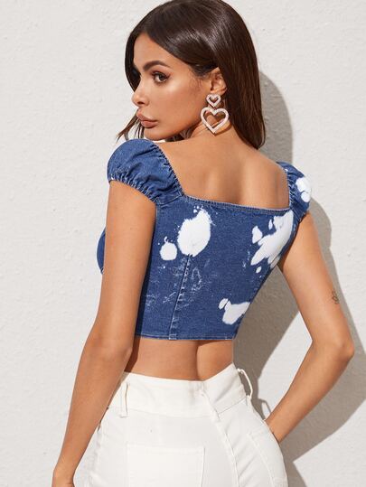 Top denim corto con lazo delantero con lavado descolorido