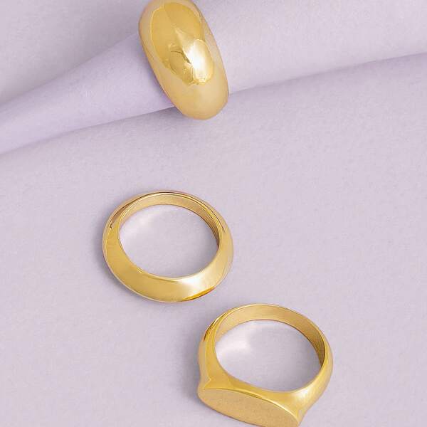 

Set Of Three Thick Curved Rings, Gold