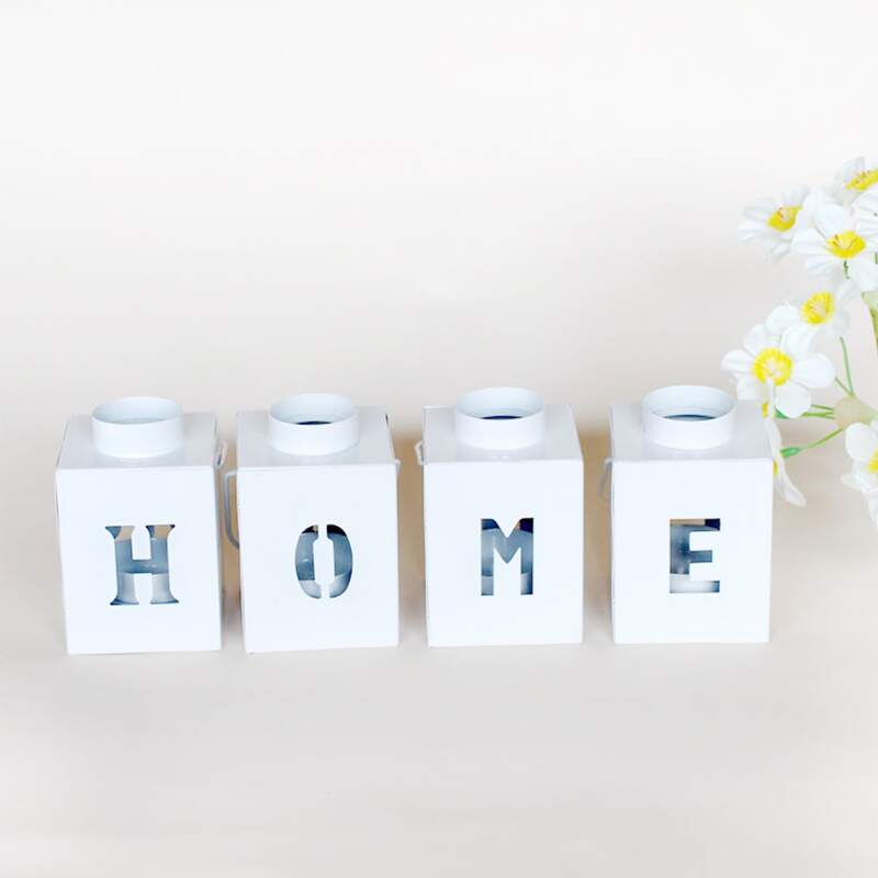 

4pcs Hollow Metal Bottle Shaped Candle Holder