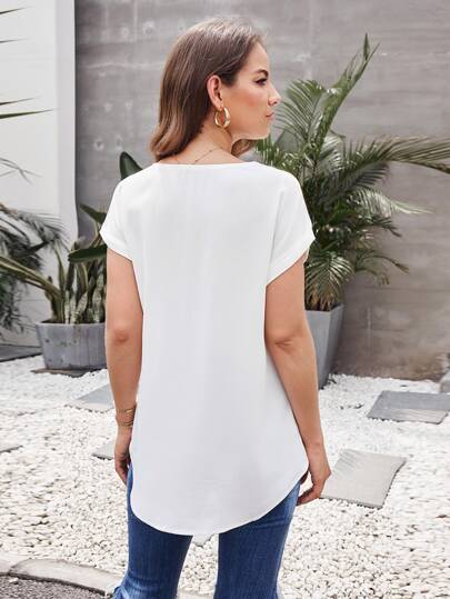 Camisa irregular con cremallera media