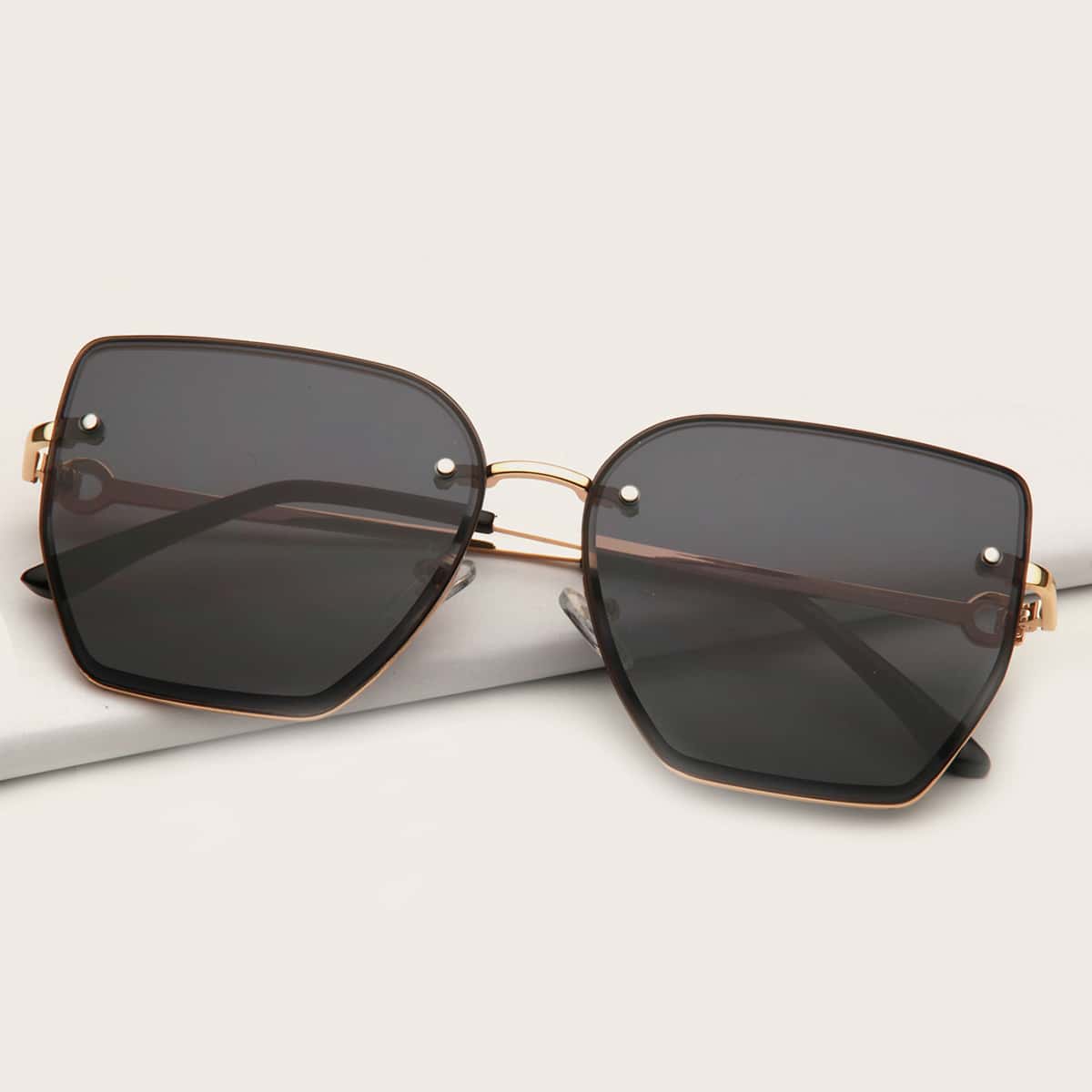 

Polygon Rimless Sunglasses With Case, Black