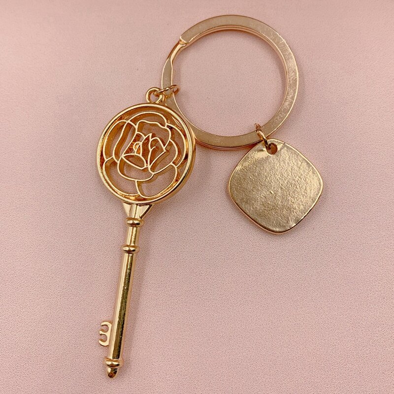 

Key & Flower Charm Keychain, Gold