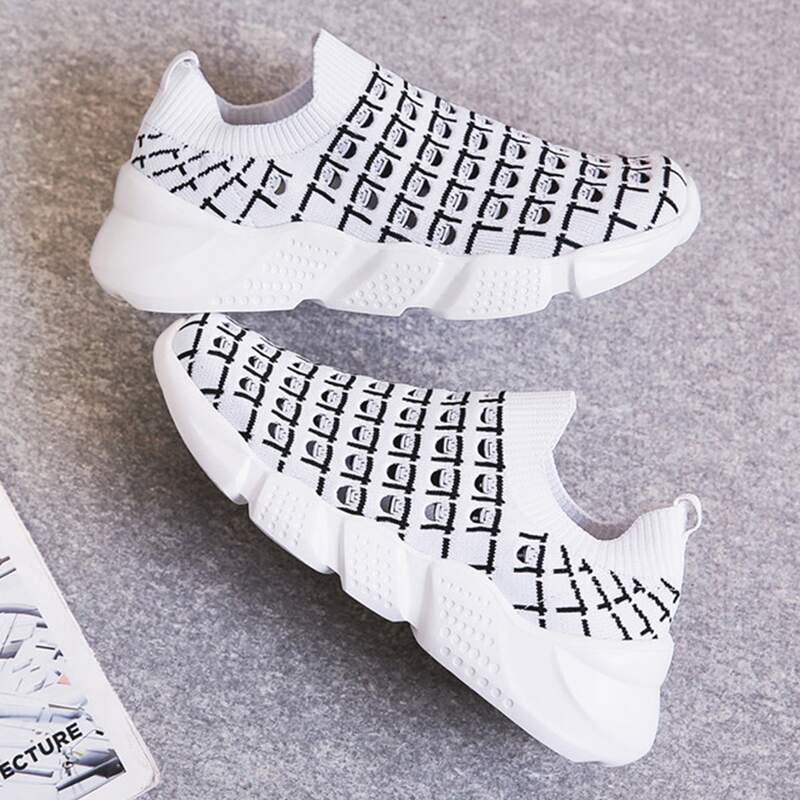 

Slip On Cut-out Knit Sneakers, Black and white