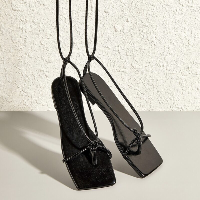 

Toe Post Tie Leg Sandals, Black