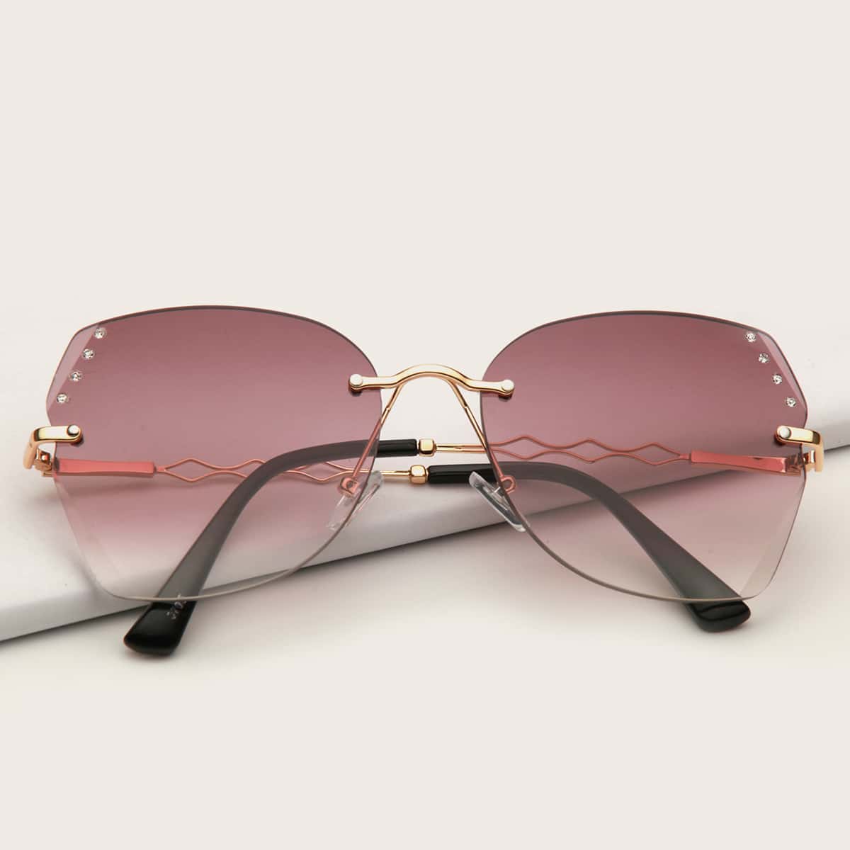 

Rhinestone Engraved Rimless Sunglasses, Multicolor