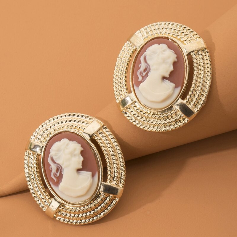 

Figure Graphic Earrings, Gold