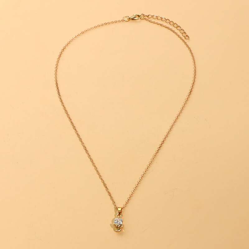 

Skull Charm Necklace, Gold