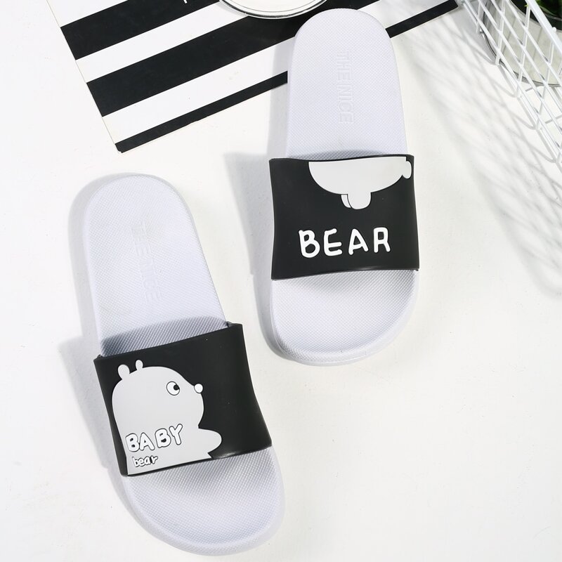 

Guys Cartoon Graphic Wide Fit Slippers, Black and white