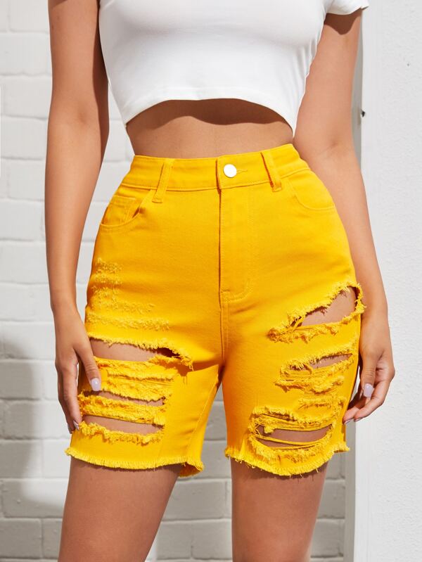 yellow ripped shorts