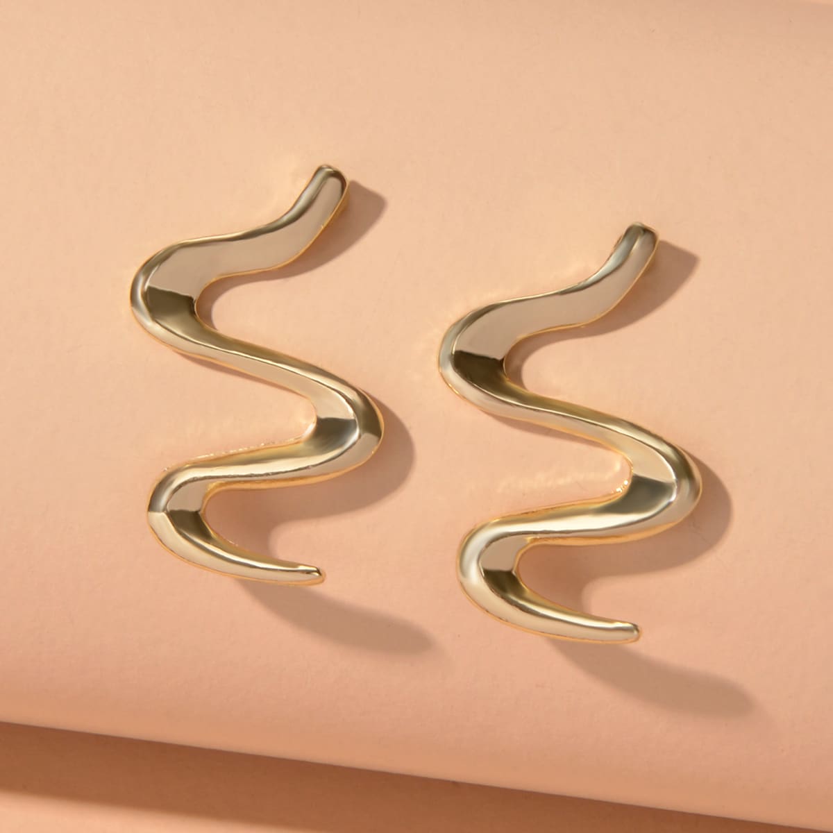 

Wave Shaped Stud Earrings, Gold