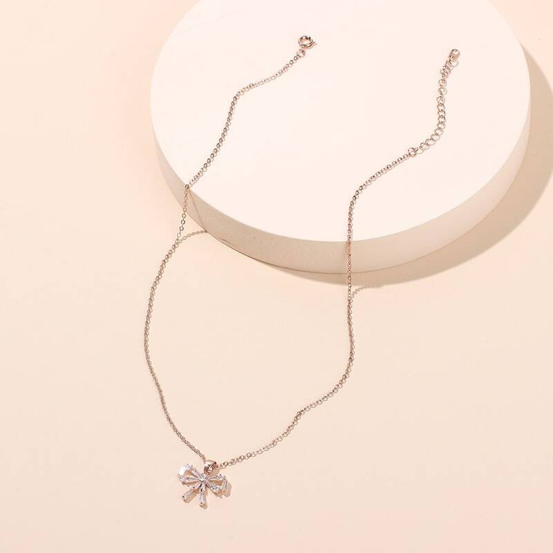 

Rhinestone Engraved Bow Charm Necklace, Gold
