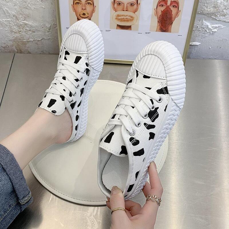 

Cow Print Lace-up Sneaker Mules, Black and white