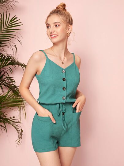 Mono de tirantes con bolsillo con botón delantero