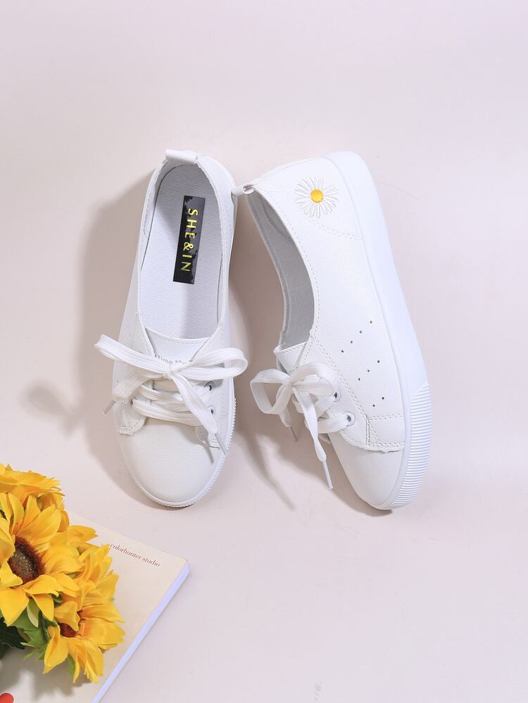 embroidered slip on sneakers