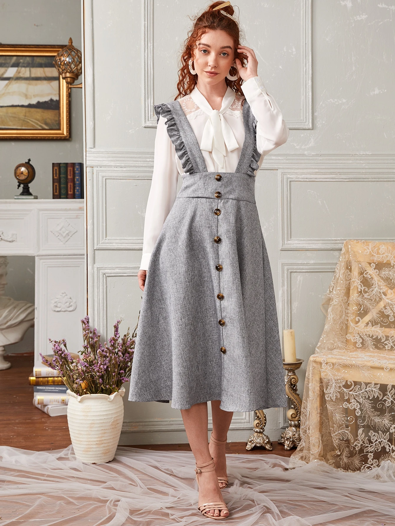 Our Wide Waistband Button Front Ruffle Suspender Dress is such a