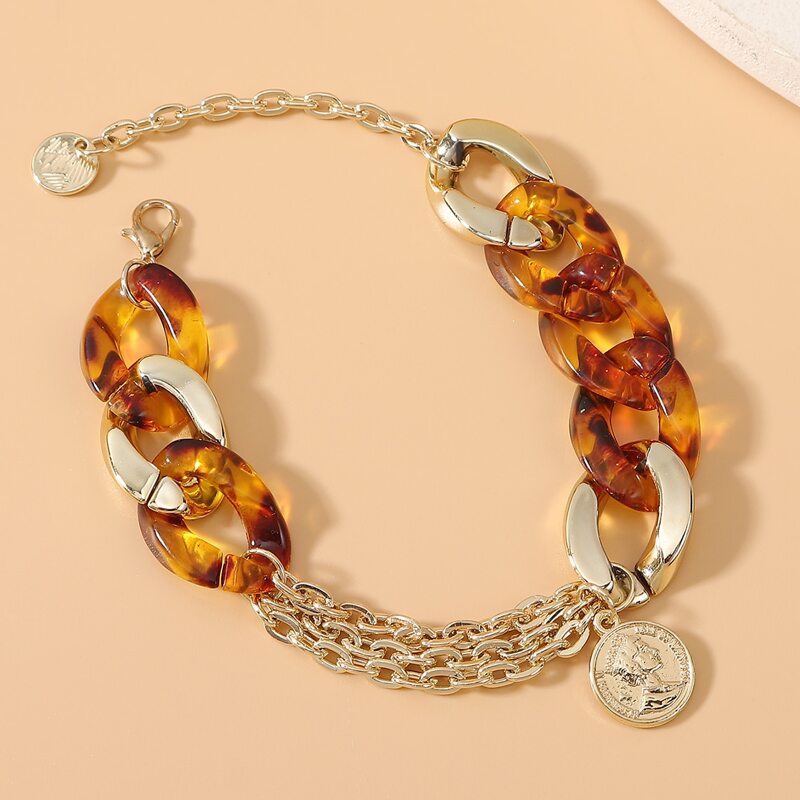 

Figure Coin Charm Bracelet, Gold