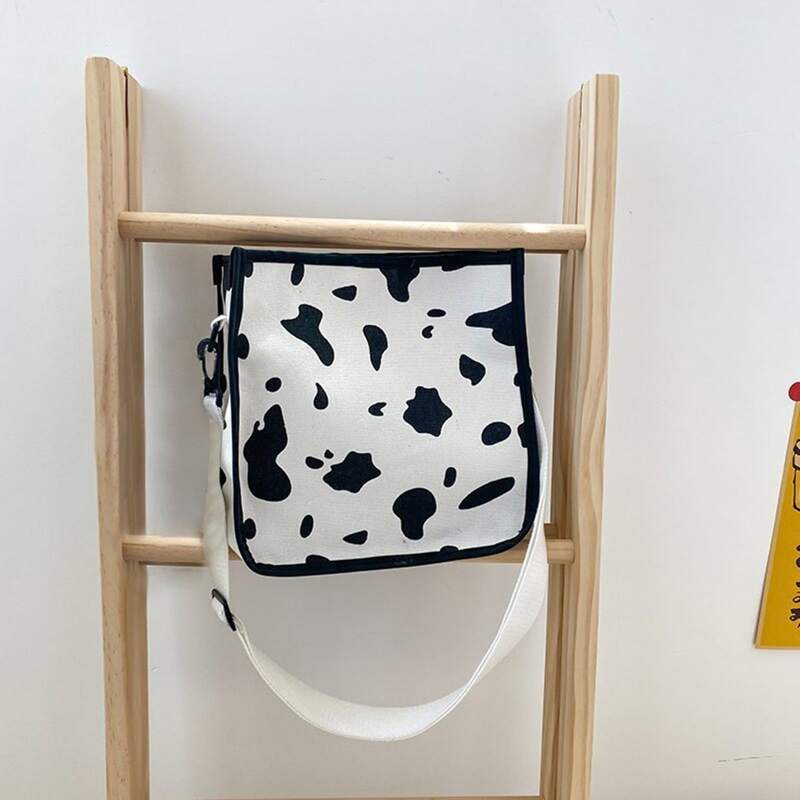 

Cow Print Crossbody Bag, Black and white