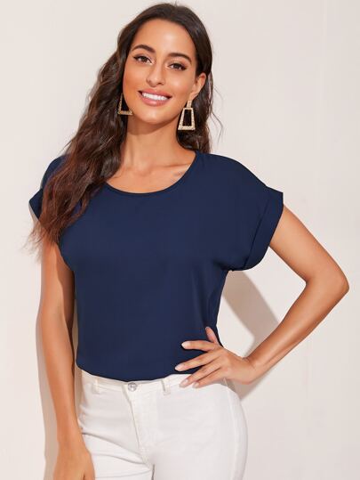 Top unicolor de manga dolman de puño doblado