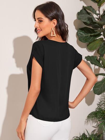 Top unicolor de manga dolman de puño doblado