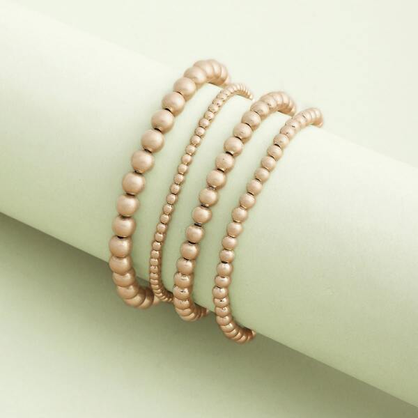 

Set Of Four Stretch Metallic Beaded Bracelets, Gold