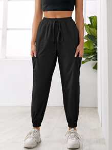 Pantalones deportivos con bolsillo con nudo unicolor - Negro - Ver 1