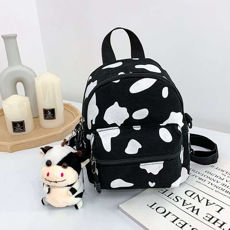 

Cow Print Backpack & Bag Charm, Black and white