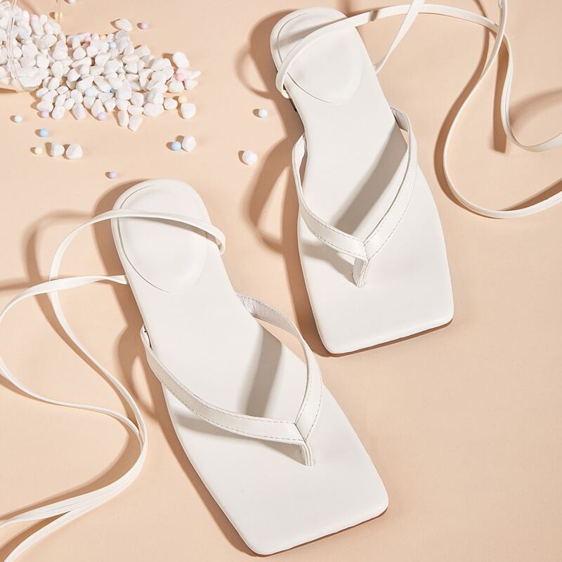 

Toe Post Tie Leg Sandals, White