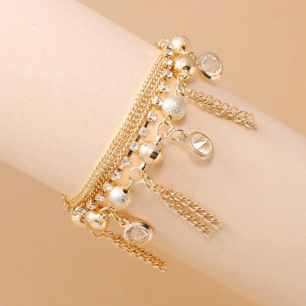 

Rhinestone Engraved Tassel Charm Bracelet, Gold