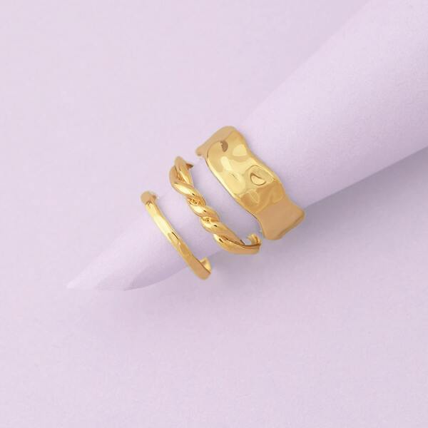 

Set Of Three Hammered And Wavy Rings, Gold