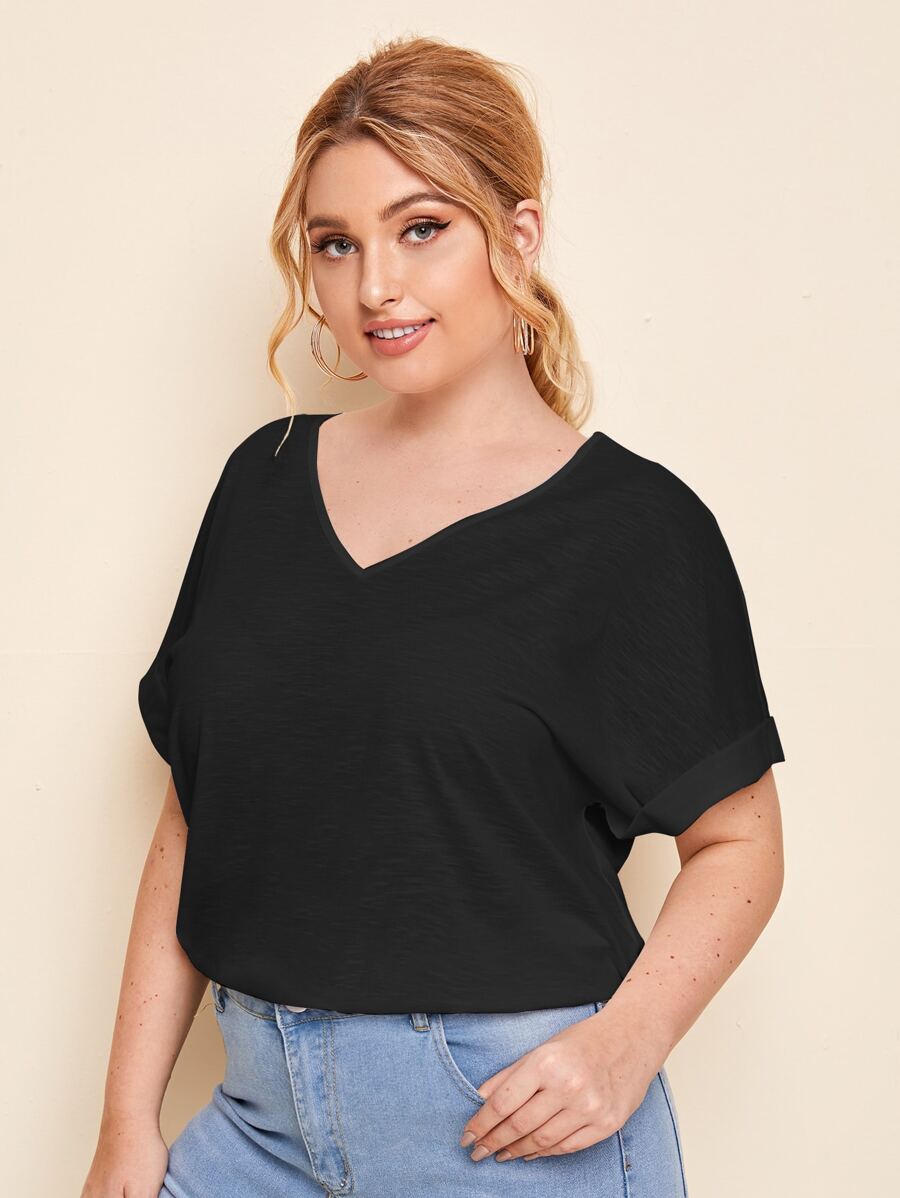 SHEIN Essnce Camiseta unicolor de manga murciélago de puño de doblez - Negro - Ver 1