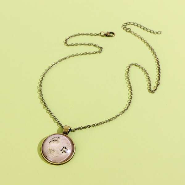 

Footprint Pattern Round Charm Necklace, Bronze