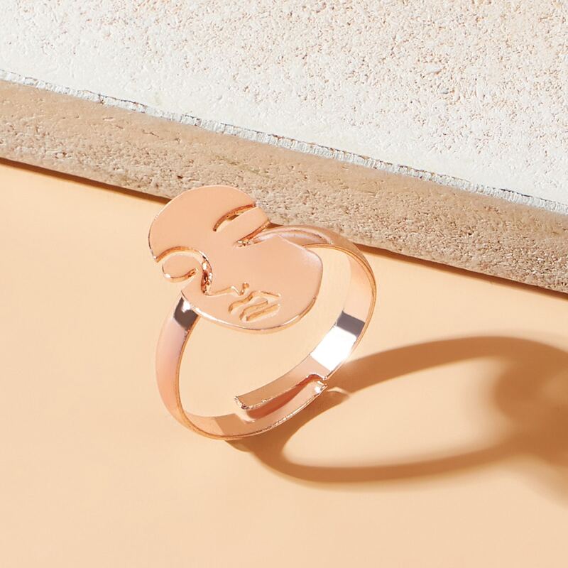 

Abstract Face Ring, Gold