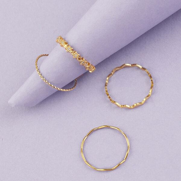 

Set Of Four Dainty Wavy Rhinestone Stacking Rings, Gold